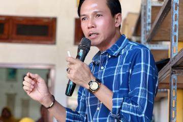 Gusril Pausi,S.Sos,.M.AP.